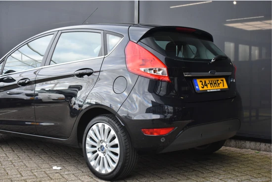 Ford Fiesta 1.25 Titanium | Cruise Control | Voorruitverwarming | Parkeersensoren | Bluetooth | Regensensor | Climate Control | 15"LMV | Air