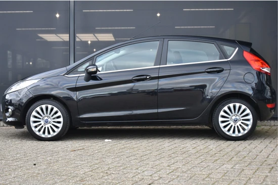 Ford Fiesta 1.25 Titanium | Cruise Control | Voorruitverwarming | Parkeersensoren | Bluetooth | Regensensor | Climate Control | 15"LMV | Air