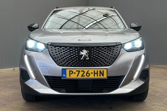 Peugeot 2008 1.2 Allure Pack | NAV | Camera | Climate & Cruise C. | LMV | Leder/stof | LED | Donker glas |