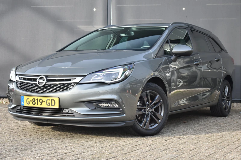 Opel Astra Sports Tourer 1.0 Turbo 120 Jaar Edition+ | Navigatie | Getint Glas | Parkeersensoren | Climate Control | Cruise Control | 1e Ei