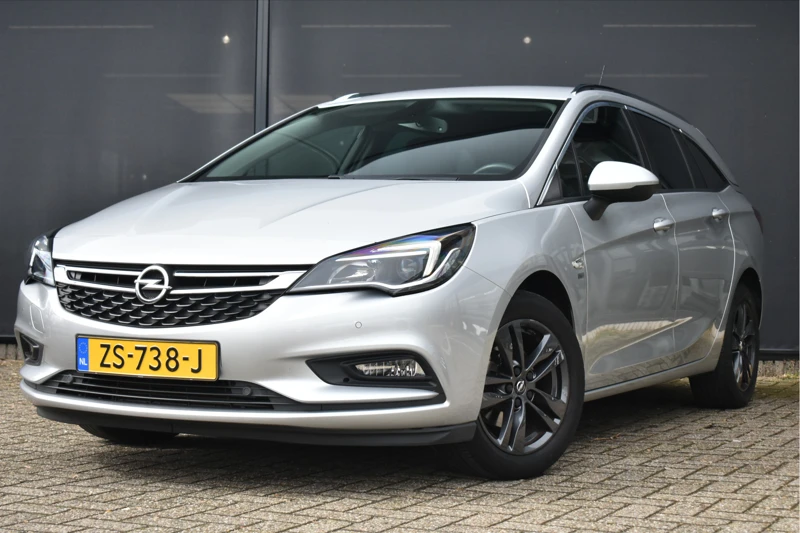 Opel Astra Sports Tourer 1.0 Turbo 120 Jaar Edition+ | Afn. Trekhaak | Navigatie | Climate Control | Parkeersensoren v/a | 1e Eigenaar | De