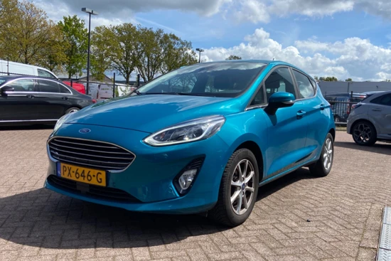 Ford Fiesta 1.0EB TITANIUM | NL-AUTO! | DEALER OH! | NAVI | CAMERA | CLIMA | VOORRUITVERWARMING | ADAPT. CRUISE | B&O | PARK SENS V+A | LM.