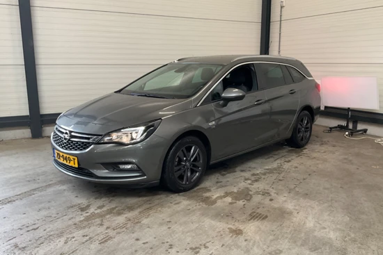 Opel Astra Sports Tourer 1.0 Turbo 120 Jaar Edition | 1e Eigenaar! | AGR | Navi | Clima | Parkeersensoren V+A | Cruise Control | 16'' Licht