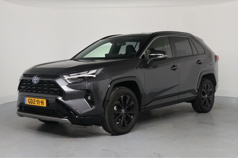 Toyota RAV4 2.5 Hybrid AWD Style Bi-Tone | LED | Clima | Camera | keyless | Stoel/Stuur Verwarming | Navi By App | Cruise Adaptive | 18'' Li