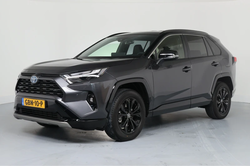 Toyota RAV4 2.5 Hybrid AWD Style Bi-Tone | LED | Clima | Camera | keyless | Stoel/Stuur Verwarming | Navi By App | Cruise Adaptive | 18'' Li