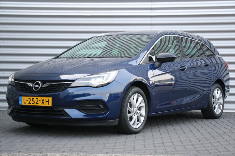 Opel Astra SPORTS TOURER 1.2 TURBO 130PK BUSINESS ELEGANCE / NAVI / LEDER / CLIMA / AGR / PDC / 16" LMV / CAMERA / KEYLESS / AFN. TREKHAAK