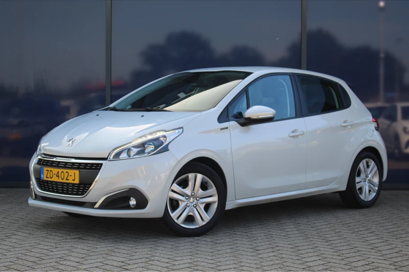 Peugeot 208 1.2 Signature 82 PK | Navi | Cruise C. | Airco | Park Assist | Bluetooth | Elec. R & Sp. |