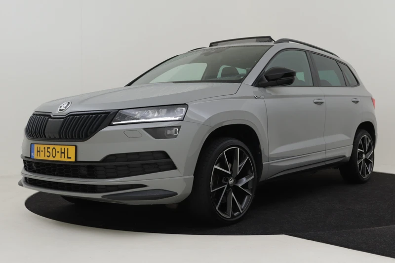 Škoda Karoq 1.5 TSI ACT 150pk Sportline Business DSG/AUT | 1e eigenaar | 100% dealeronderhouden | Adaptief cruise control | Panorama dak | D