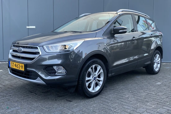 Ford Kuga 1.5 150pk EcoBoost Titanium | Trekhaak 2.000kg! | Elektrische klep | Camera | Half leder | Parkeersensoren voor-achter | Voorrui