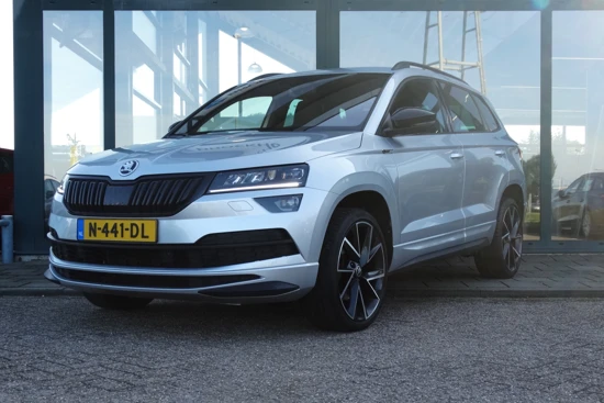 Škoda Karoq 1.5 TSI ACT Sportline Business | Achteruitrijcamera | Navigatie | Stoel + stuur + voorruit verwarming | Trekhaak