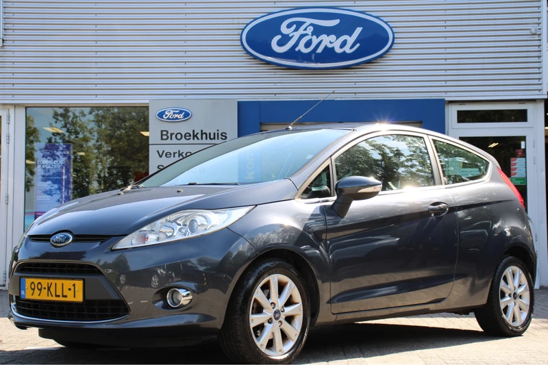 Ford Fiesta 1.25 82PK GHIO | UNIEK: 1e EIGENAAR! | NL-AUTO! | DEALER OH! | LMV | VOORRUITVERWARMING | AIRCO | PRACHTIGE STAAT!