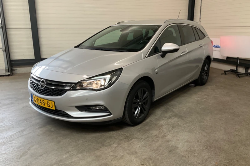 Opel Astra Sports Tourer 1.0 Turbo 120 Jaar Edition | Dealer Onderhouden! | Navi | Clima | Parkeersensoren V+A | Lichtmetalen Velgen