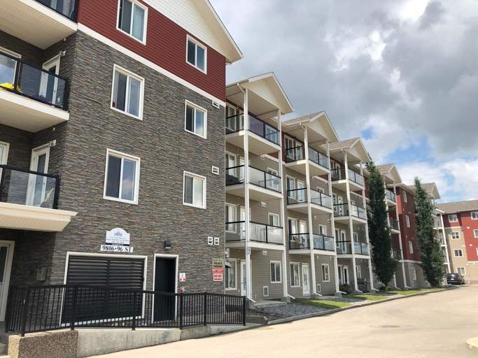 Photo of 9806 96 Street -Center Court Property Image
