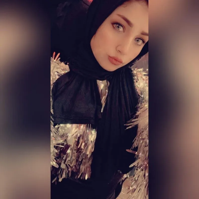 Close-Up Portrait With Black Headscarf
