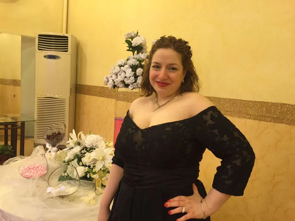 Woman in Black Off-Shoulder Dress