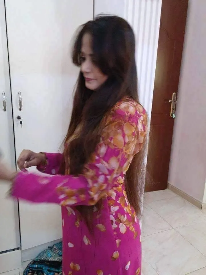 Woman in Magenta Floral Dress