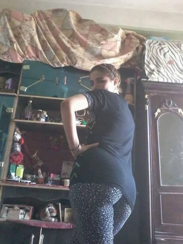 Clothed Person Posing Indoors