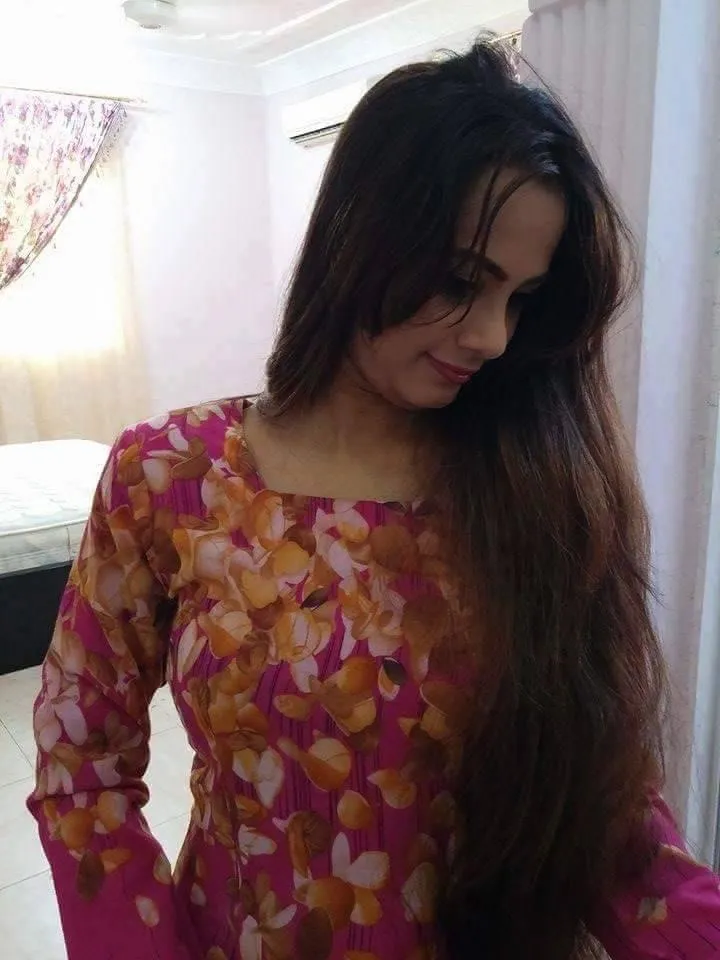 Long Haired Woman in Floral Dress