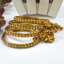 Golden Textured White Stone Studded Bell Fall Bangles Set For Women- 4 Bangles Set