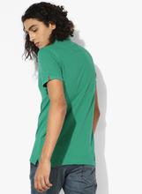 Levi’s Green Solid Regular Fit Polo T-Shirt