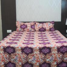 Rangoli Purple Flower Orange Flower Maroon And Multicolor Design Bedsheet With Free Pillow Covers