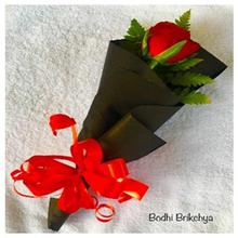 Single Dutch Rose Wrapped in a Black Paper Bouquet