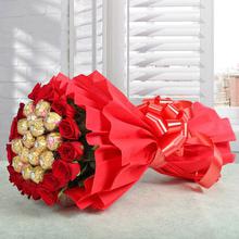 20 red roses with choclate in paper packing