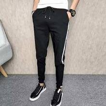 Black Stretchable Joggers With White Stripe