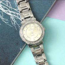 Ultima Silver Round Dial Stone Studded Analog Watch For Women