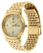 Titan Analog Champagne Dial Women'S Watch - 2558Sl02