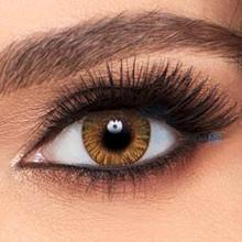 Cosmetic powerless contact lens in honey color