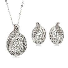 Silver Toned Hollow Leaf Crystal Earrings And Chain Set