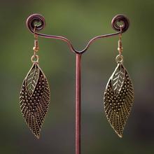Golden Leaf Adorned Dangler Earrings