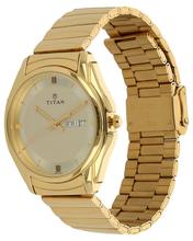 Titan Karishma Analog Champagne Dial Women's Watch - 2601YM01