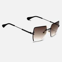 SQ.Rimless Lenses in Lt.Shaded Brown With Stylish Black Metal Legs