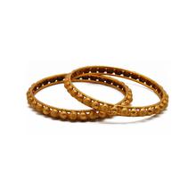 Golden Ball Strand Gold Toned Bangle For Women