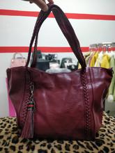 Tassled design handbag for women