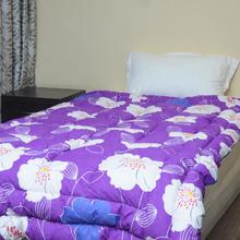 Rangoli White Flower In Purple Single Bed Quilt