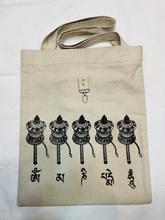 Buddhist prayer wheel print cotton tote bag
