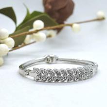 Silver Toned Stones Embellished Leaf Designed Bracelet For Women- (BT_032)