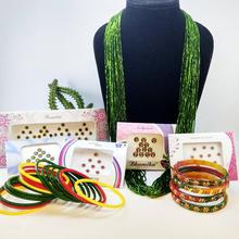 Pack Of Chunky Potey Mala, Stone Studded And Plain Glass Bangles Set With Free Tika (5 Packets)