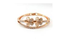 Rose Gold Toned Flower Designed Embellished Bracelet For Women - (BT_019)