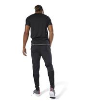 Kapadaa: Reebok Black/Grey Training Woven Trackster Pants For Men – DP6578