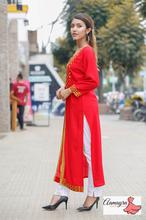 Red double layer kurti with embroidery work ,mustard colour inside.