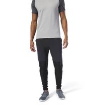 Kapadaa: Reebok Black/Grey Training Woven Trackster Pants For Men – DP6578