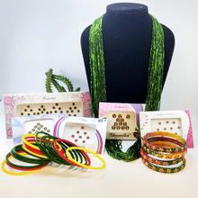 Pack Of Chunky Potey Mala, Stone Studded And Plain Glass Bangles Set With Free Tika (5 Packets)