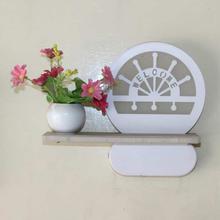 White Wall Light Featuring Flower Pot & Welcome Print