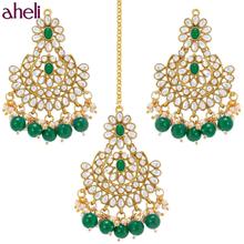 Aheli Gold Plated Kundan Pearl Chandbali Earring Maang Tikka Jewellery Set for Women