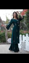 Printed dark green kurti with tassels work and sharara