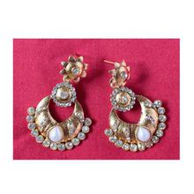 Flower shaped earrings set with pearl and faux crystal for women